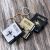 Assorted Pack of 12 x Mini Cover Holy Bible Keyrings Presented in Organza Gift Pouch